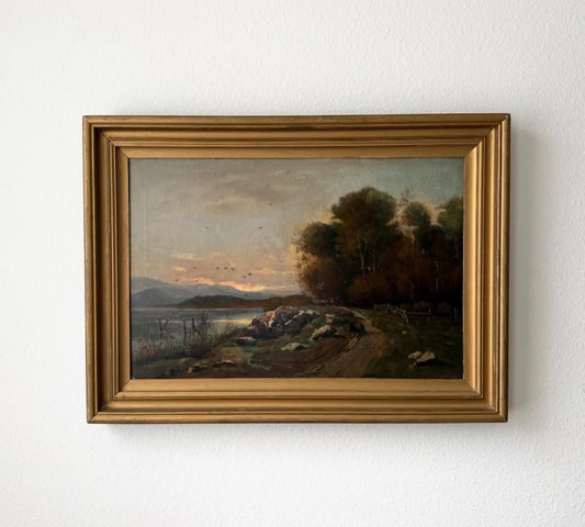 Beautiful oil landscape painting on board depicting a serene lakeside scene at sunset