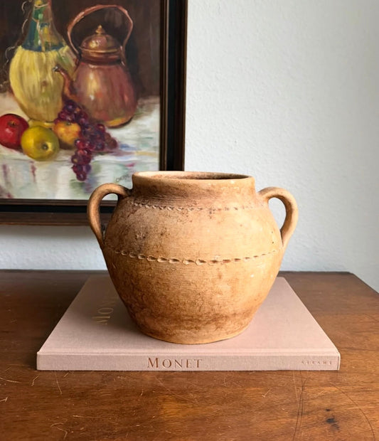 Double-handle terracotta vessel